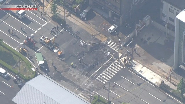Water gushes on to highway in Japan's Kyoto City