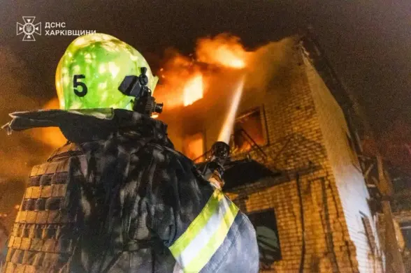 First responders work at the site of Russian drone attack in Kharkiv late on April 29. 2025 (State Emergency Service)