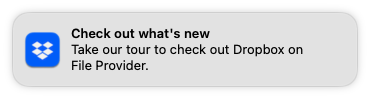 Screen capture of a macOS notification from Dropbox saying, "Check out what's new. Take our tour to check out Dropbox on File Provider."