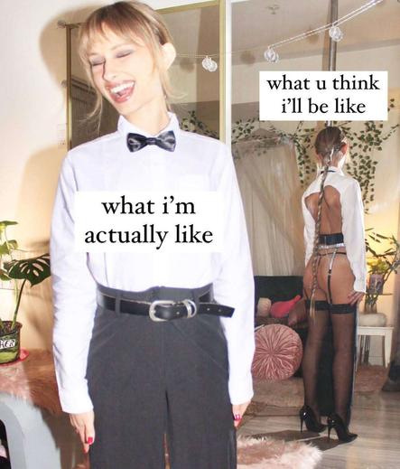 pretty blonde wearing a cater waiter outfit from the front and from the back it's a cutaway showing her very long braid and stockings/thong.