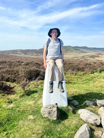 Me sitting on a trig point