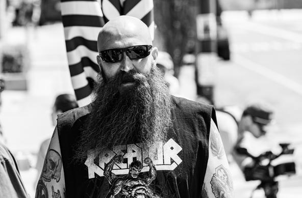 This interesting guy who looks like he could take me apart and NOT put me back together again.  Street photography is not for the faint of heart.