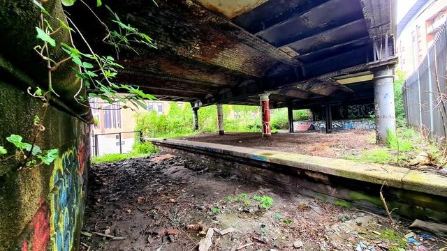 An abandoned railway station under a road bridge in the Partick area of Glasgow.