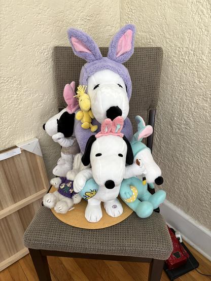 Picture of multiple Snoopy’s dressed as bunnies.