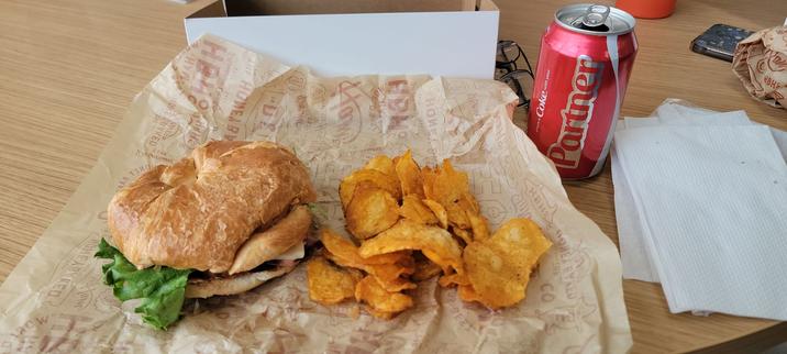 Ham Croissant Sandwich with BBQ Crisps from Honey Baked Ham.
Served with a can of Coke.