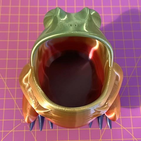 A 3D printed frog with a wide open mouth