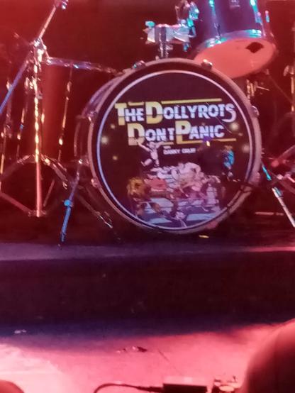 Drumset with "The Dollyrots X Dont Panic" tour logo on it