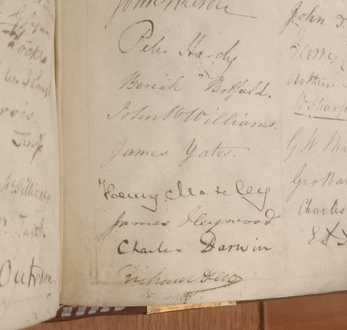 Page of Charter Book of Fellows of the Royal Society of London showing the signature of Charles Darwin and others