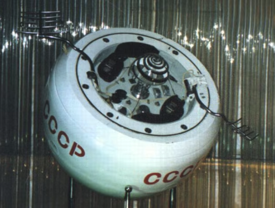 A white donut like object, Soviet Union’s Venera 8 spacecraft it says CCCP on the side.