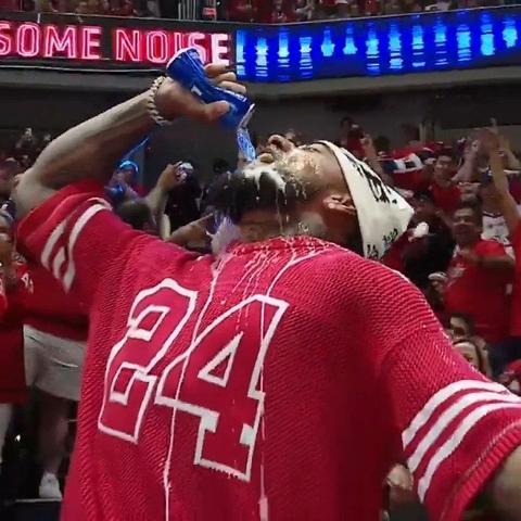 Frankie Luvu deletes a beer at the Caps’ Game Five vs Montreal
