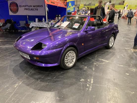 Purple Quantum 2+2 Convertible, front quarter view