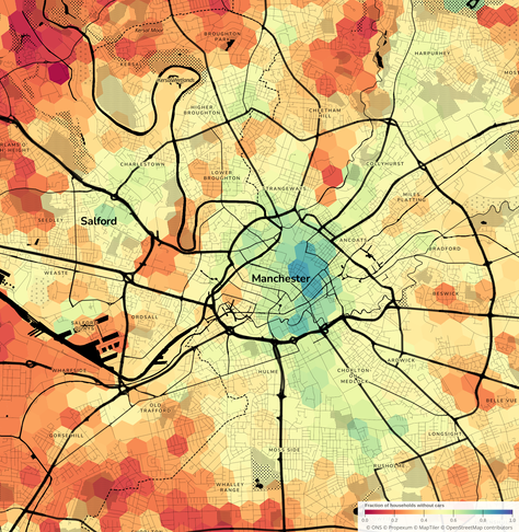 a chloropleth map of Manchester showing the fraction of households without any cars. blue = 100% car-free (zero cars), red = 0% car-free (100% cars)