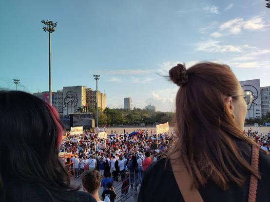 An image of the middle of the May Day Brigade in Havana on La Plaza De La Revolución with two of my friends left and right