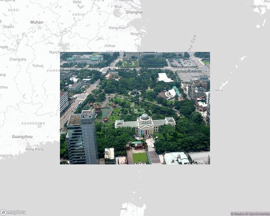 A photo of or from a park from the linked website, overlaid on a cropped world map where it's located.