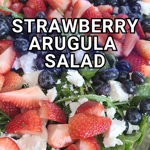 This strawberry arugula salad is a delightful recipe served with a balsamic vinaigrette.