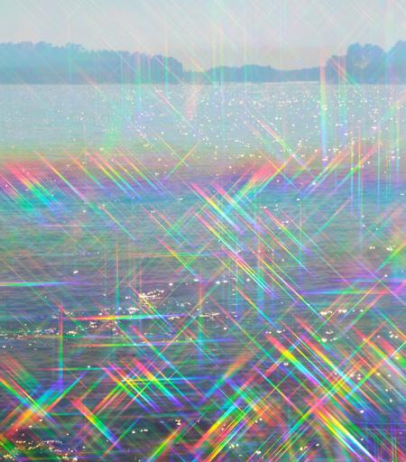 Sea sparkling in rainbow colors