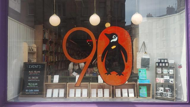 The finished Penguin 90 painted window and book display in the Edinburgh Bookshop