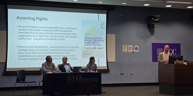 Speaker with panel, Dr Dug Cubie, Tom Flynn SC, Prof. Aoife Daly.