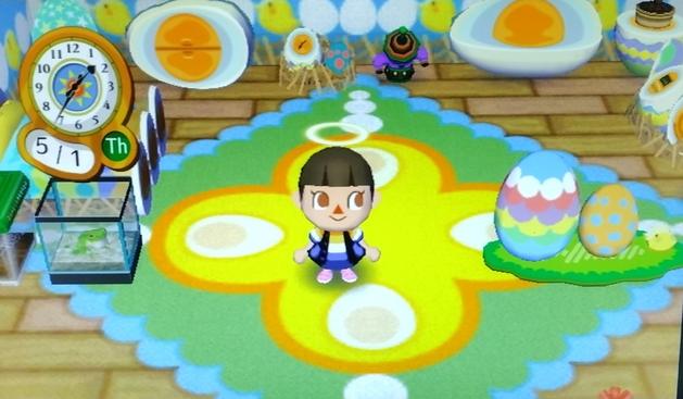 Brown haired city folk player standing on an egg themed room. She is wearing a custom design meant to look like a black vest with blue pockets, with over a tee in the aro ace colors of orange, yellow, white, blue, and darker blue. Because the character is a girl, the game conforms the design to the shape of a dress.