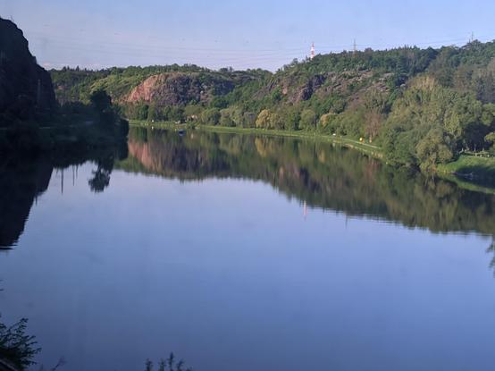 large river with steep hills on both sides.