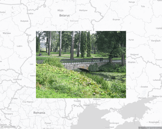 A photo of or from a park from the linked website, overlaid on a cropped world map where it's located.