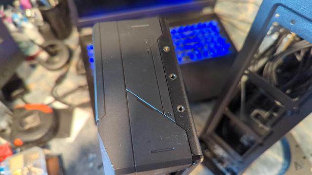 Back of the Sapphire 9070XT GPU, with three threaded inserts visible. These are part of the card from the factory, and a really nice feature!