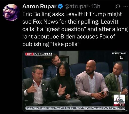 A tweet from Aaron Rupar (@atrupar
) posted 13 hours ago reads: "Eric Bolling asks Leavitt if Trump might sue Fox News for their polling. Leavitt calls it a 'great question' and after a long rant about Joe Biden accuses Fox of publishing 'fake polls'." The tweet includes an image from an RSBN broadcast in Washington, D.C., showing four people seated on a panel, with a ticker at the bottom: "RING COLUMBUS DAY 'BACK FROM THE ASHES' RUBIO SENDS STRONG MESSAGE ON TRUMP."
