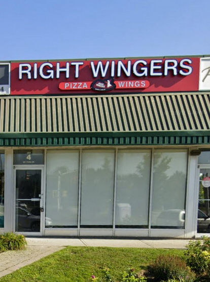 Storefront photo of a pizza and wings takeout spot called Right Wingers