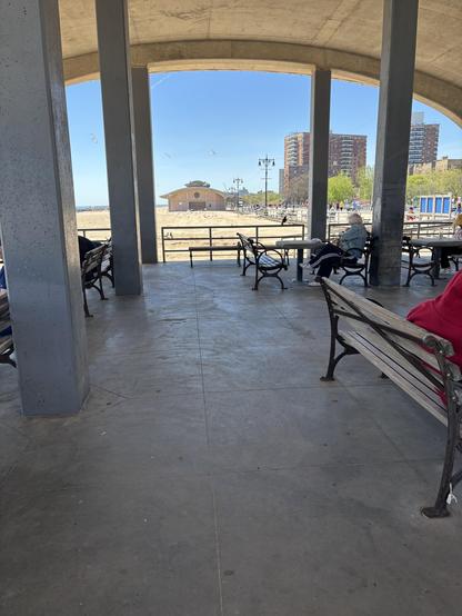 Another view of public shelter, Brighton Beach Park. Similar shaped building is seen in the distance.