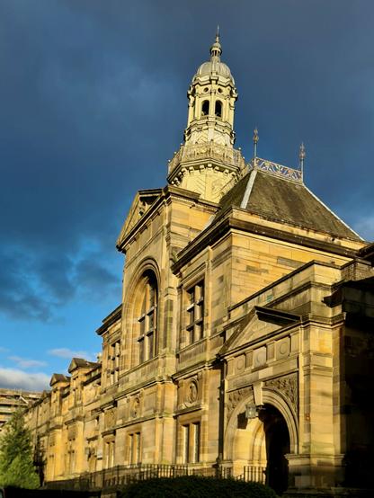 An ornate blonde sandstone Victorian municipal building in the Partick area of Glasgow.