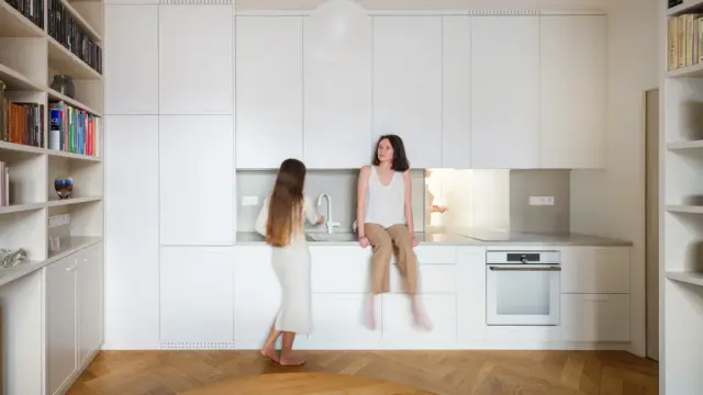 The team of studio No Architects transformed an average 82-square-meter apartment into an 11-room home.