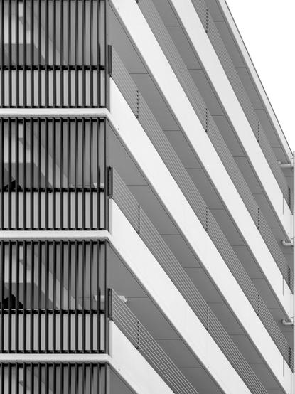 High contrast monochrome shot of apartment block; a little abstract.