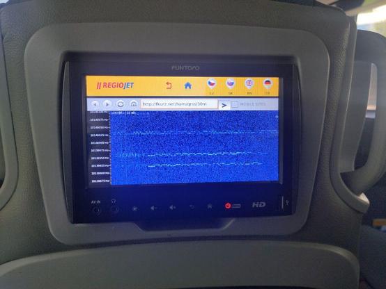 A HMI mounted on a bus seat that shows a browser with an old android interface. The browser shows the QRSS grabber SO5CW, with QRSS signals from S52AB, G0MBA and G0PKT.
