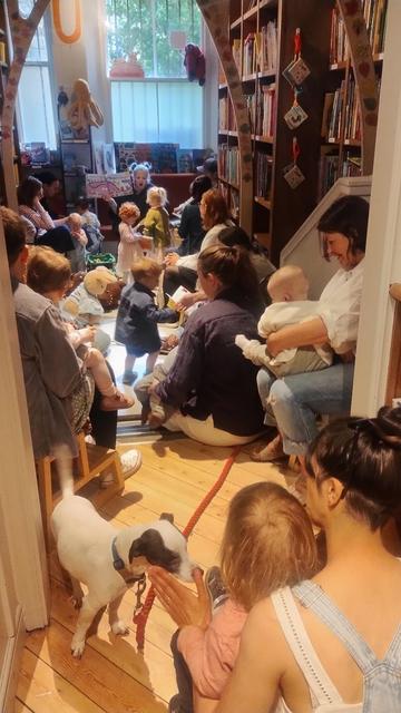 Looking into a packed children's room in the Edinburgh Bookshop, during a very busy Under Fives Storytime.