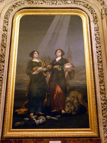 a portrait of two Christian martyrs, with Seville cathedral as a backdrop. As is usual, the painting depicts the circumstances of their martyrdom.