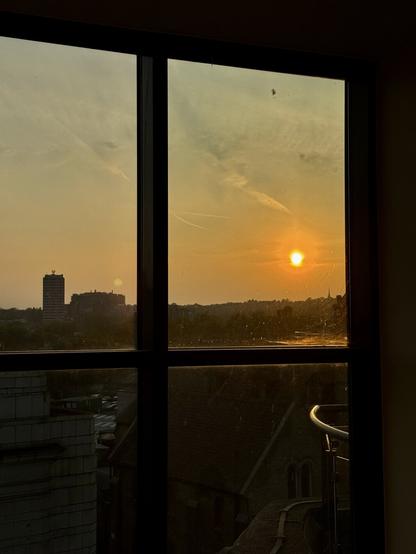 Sunset seen through a window.