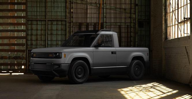 plain gray pickup car in a warehouse setting.