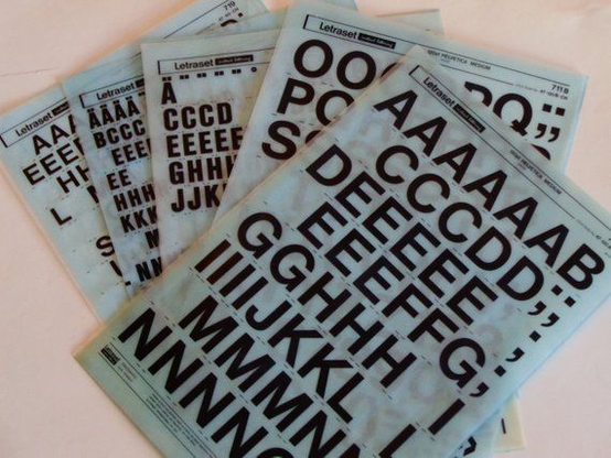 Several sheets of Letraset dry-transfer letters