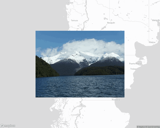 A photo of or from a national park from the linked website, overlaid on a cropped world map where it's located.