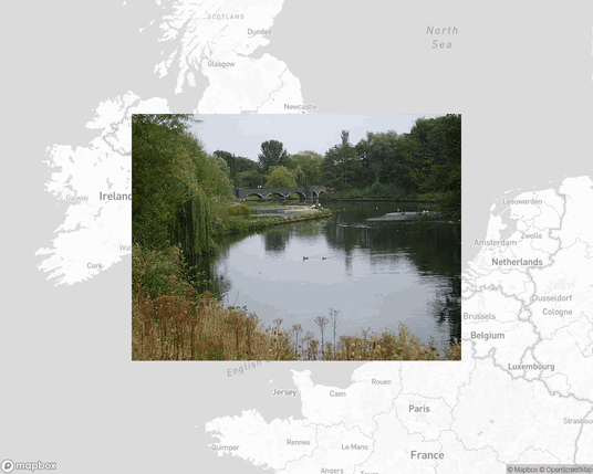 A photo of or from a park from the linked website, overlaid on a cropped world map where it's located.