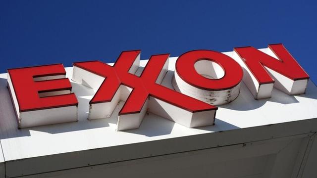 Profits for American oil giants like Exxon Mobil and Chevron fade in tandem with oil demand