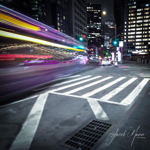 Streaking city lights street photography of an intersection in New York City