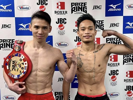 Jukiya Iimura (left) and Esneth Domingo (right) strike a pose during the official weigh-in.