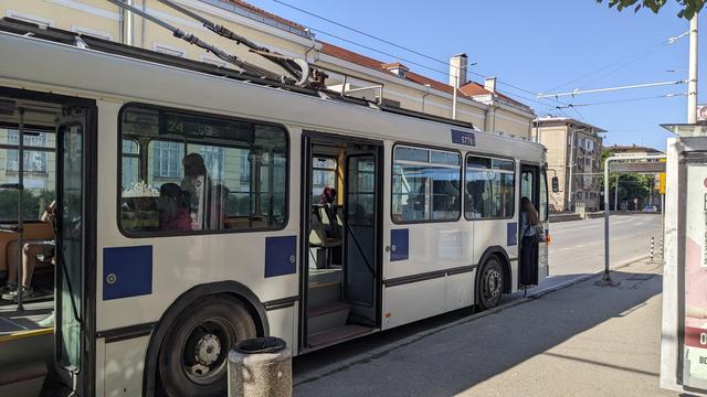 A cute old trolleybus in a small stop.