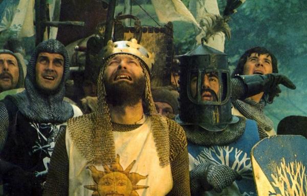 king arthur’s and his knights staring up at something.