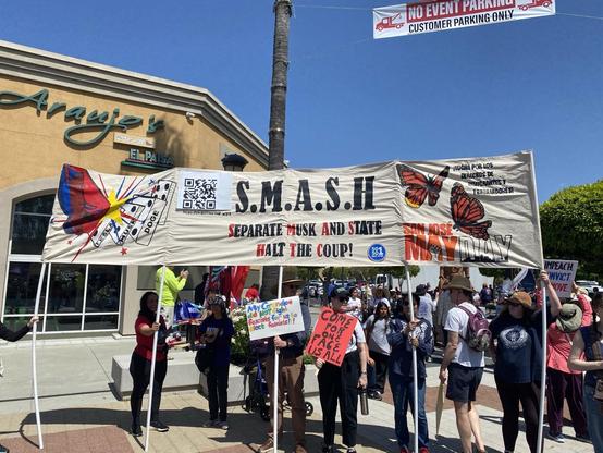SMASH Separate Musk And State Halt The Coup sign a Mayday Protest https://smashthecoup.xyz/stc/