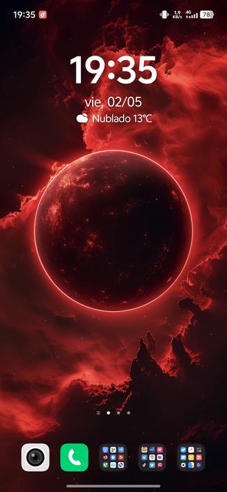 Captura de pantalla de escritorio de smartphone con el perfil de un planeta en el espacio con el perfil en rojo y fondo negro.