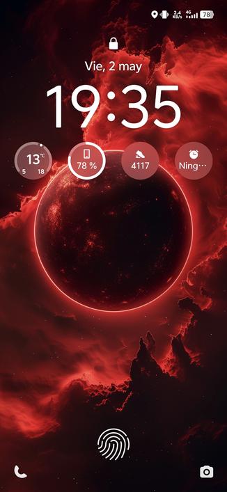 Captura de pantalla de bloqueo de smartphone con un planeta con el perfil en rojo sobre el fondo negro del espacio.