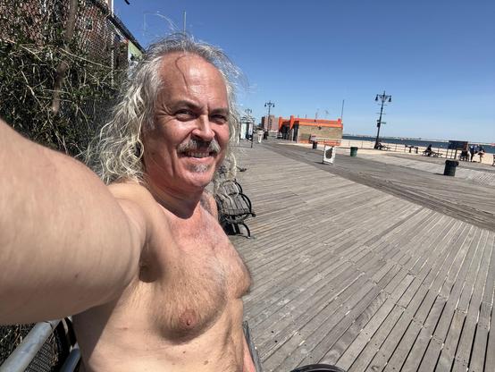 Selfie on beach boardwalk, facing east.