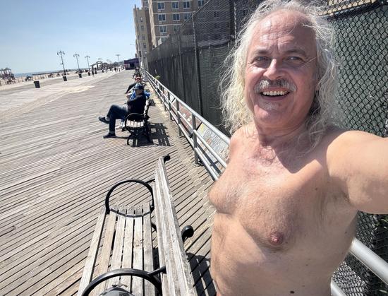 Selfie on beach boardwalk, facing west.